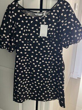 Paris Atelier dress in black with heart in beige color, puff sleeves